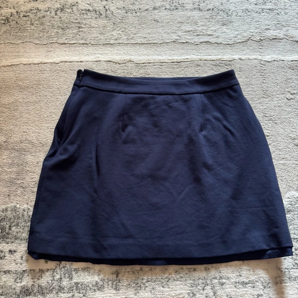 Ann Taylor Loft rich navy faux wrap asymmetrical skirt with faux pocket accent